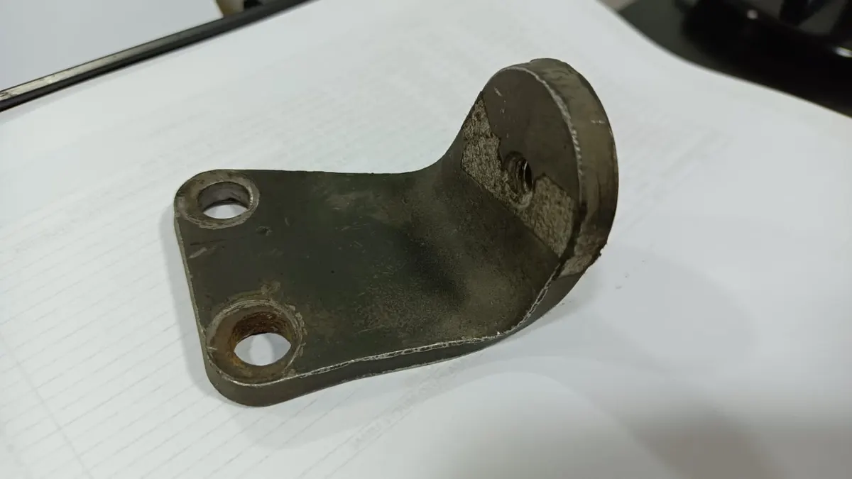 Soporte de tubo de admisión